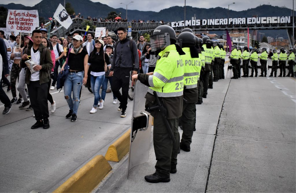Students protesting university budget cuts last year. The marches were mostly peaceful but clashes did occur, often between ESMAD riot police and masked agitators. Photo: Steve Hide